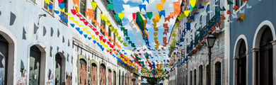 Image of flags hanging down a street in Brazil 