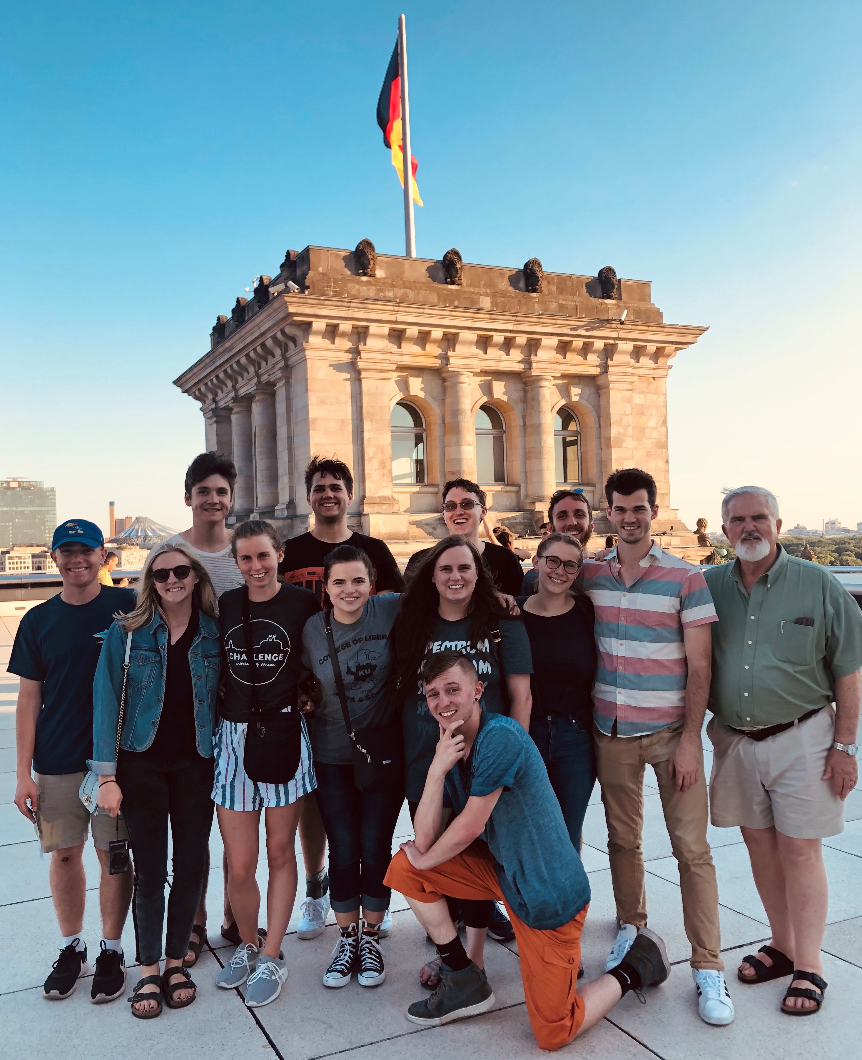 students and advisors stand together in Bundestag Berlin