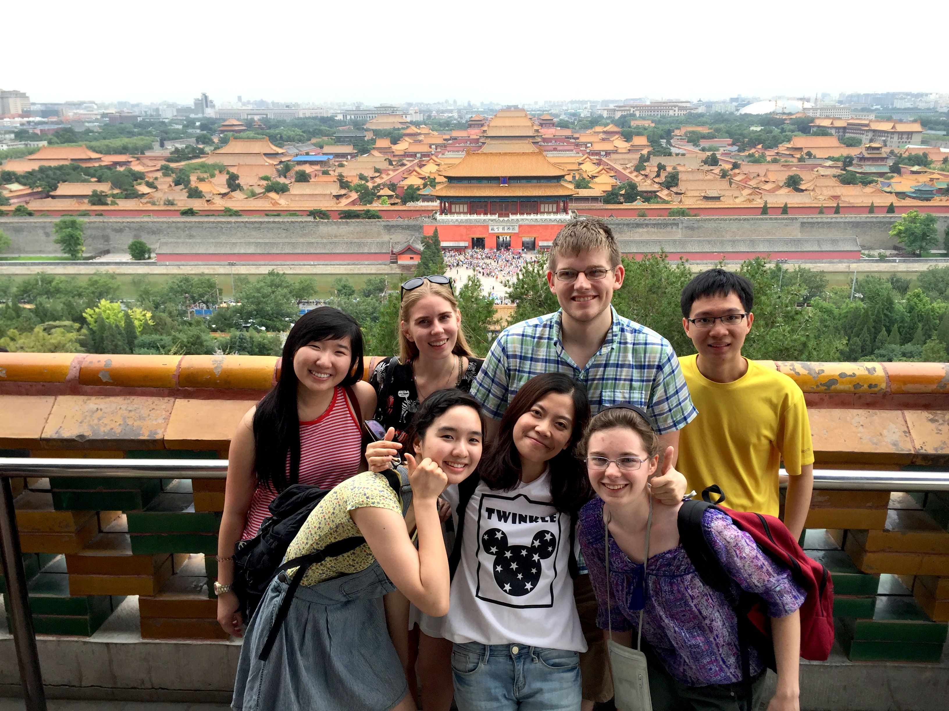 Seven students stand together in China