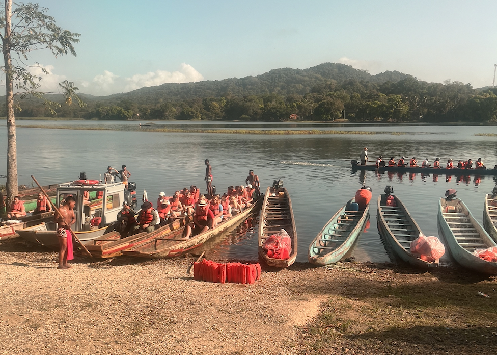 Image of the group on a canoe by the shore